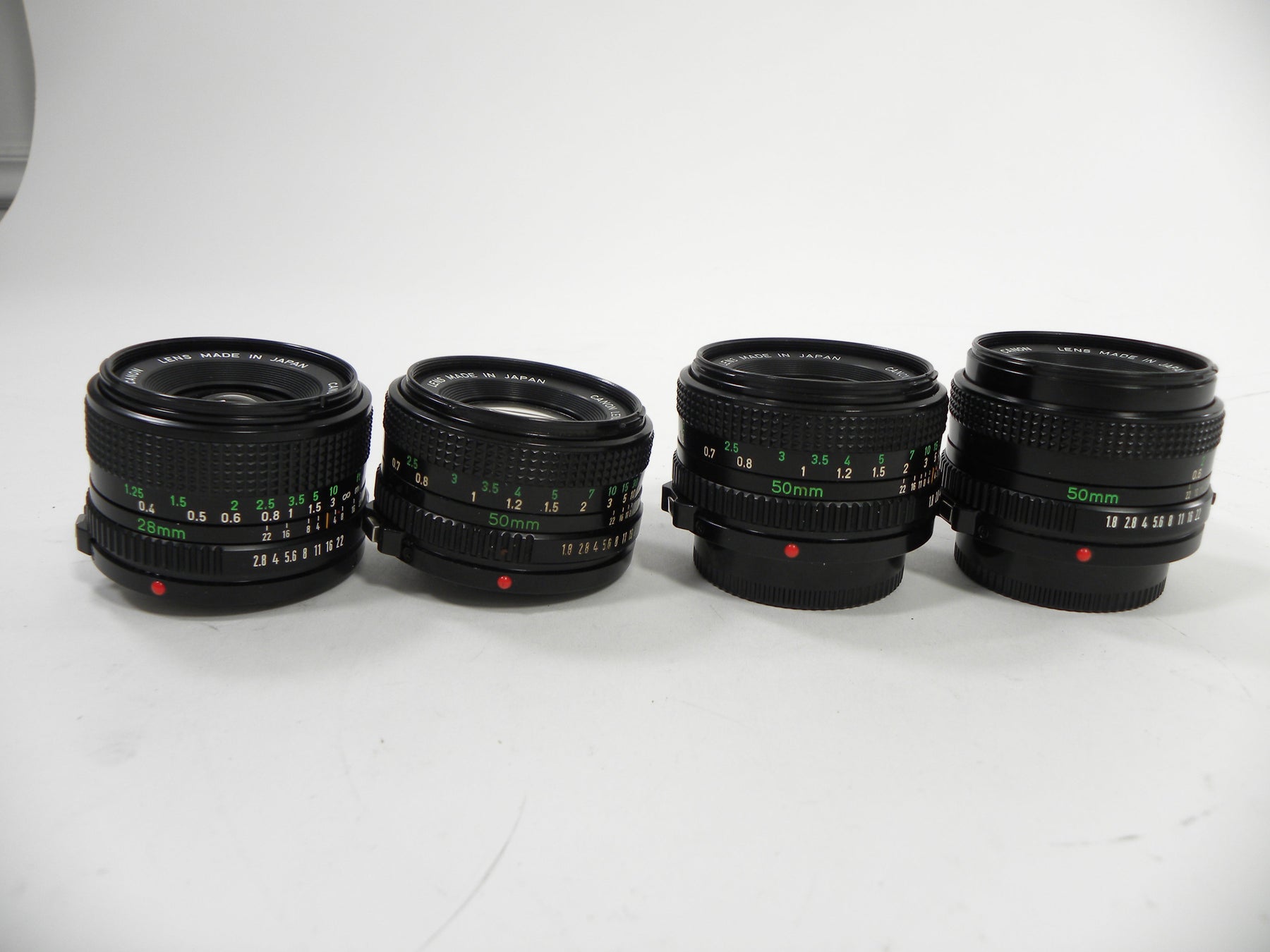 Canon FD 50mm f1.8 & 28mm f2.8 lot of 4 AS IS NO RETURNS!! (parts or repair)