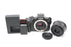 Canon R100 Digital Mirrorless Camera with 18-45mm f/4.5-6.3 IS STM RF-S Lens with Shutter Count Less Than 1,000