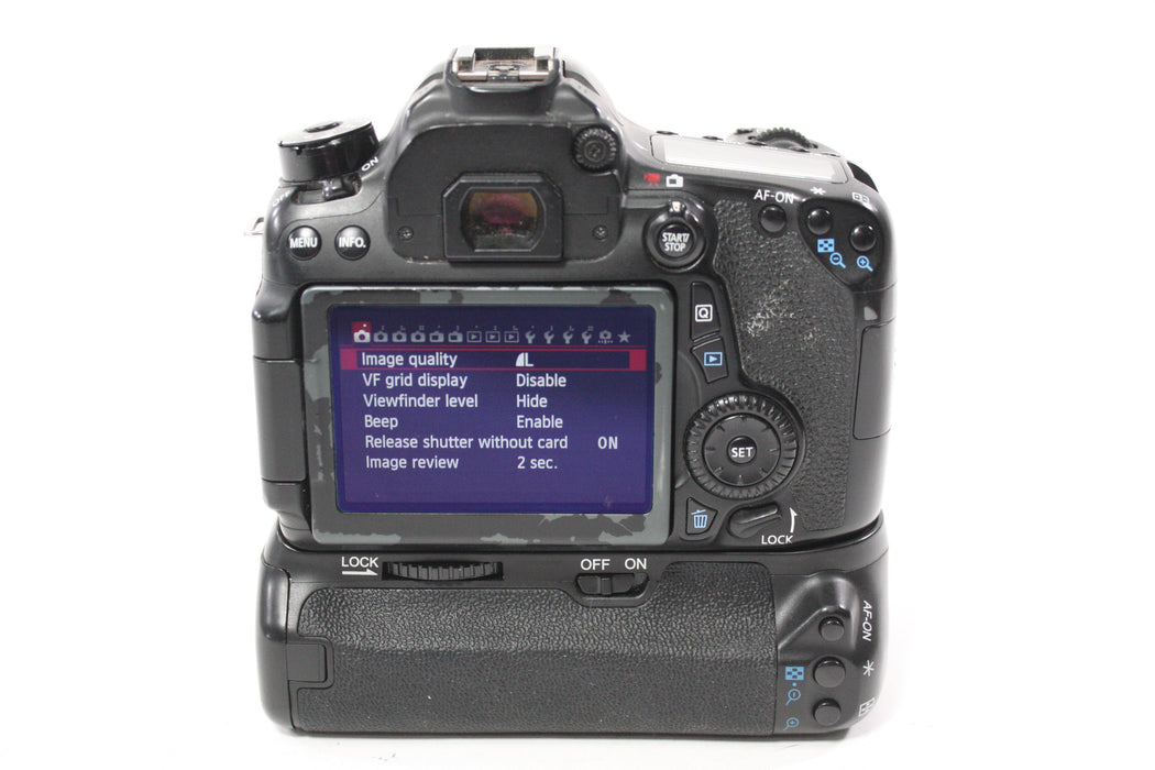 Canon 70D DSLR Camera Body with Shutter Count 31,469 With Meike MK-70D Grip (Please Read)