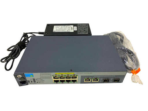 J9780A I HPE Aruba 2530 8 PoE+ Switch + 90 Watt AC External Power Adapter