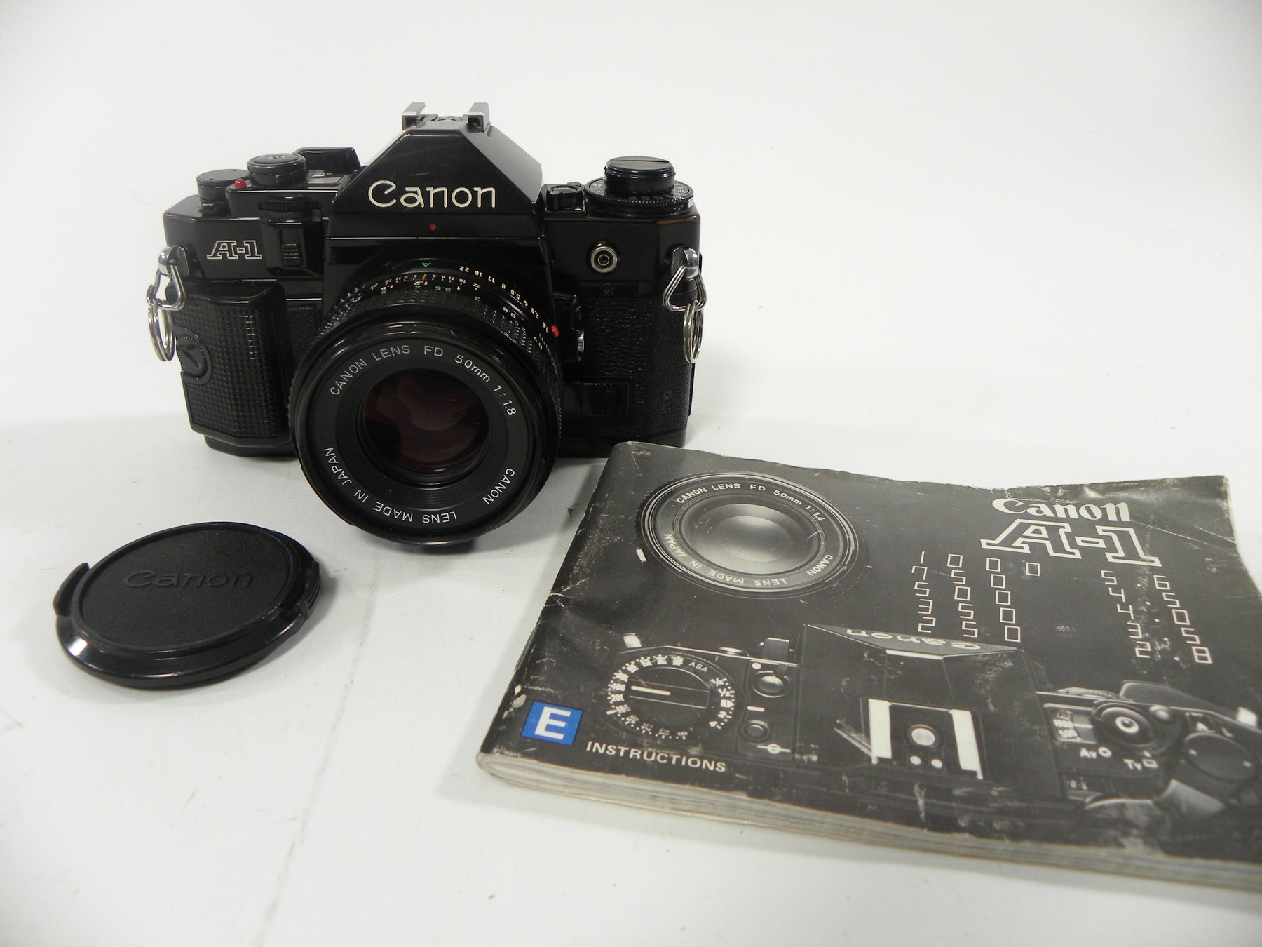 Canon A-1 35mm SLR w/FD 50mm f1.8 (Black)