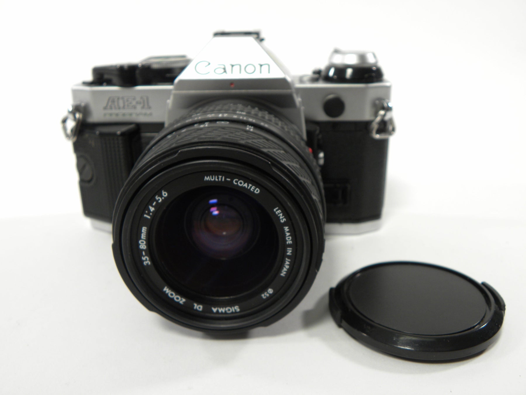 Canon AE-1 35mm Program SLR w/Sigma DL Zoom MC 35-80mm f4-5.6