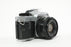 Canon AE-1 35mm SLR Camera with 50mm f/1.8 FD Lens