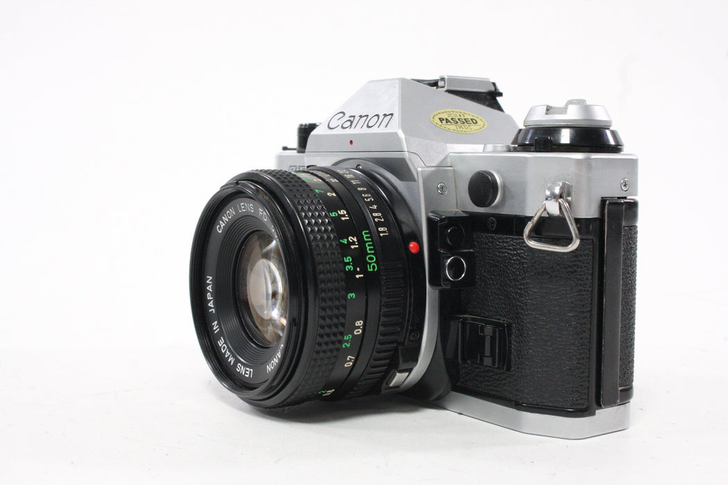 Canon AE-1 Program 35mm SLR Camera with 50mm f/1.8 FD Lens