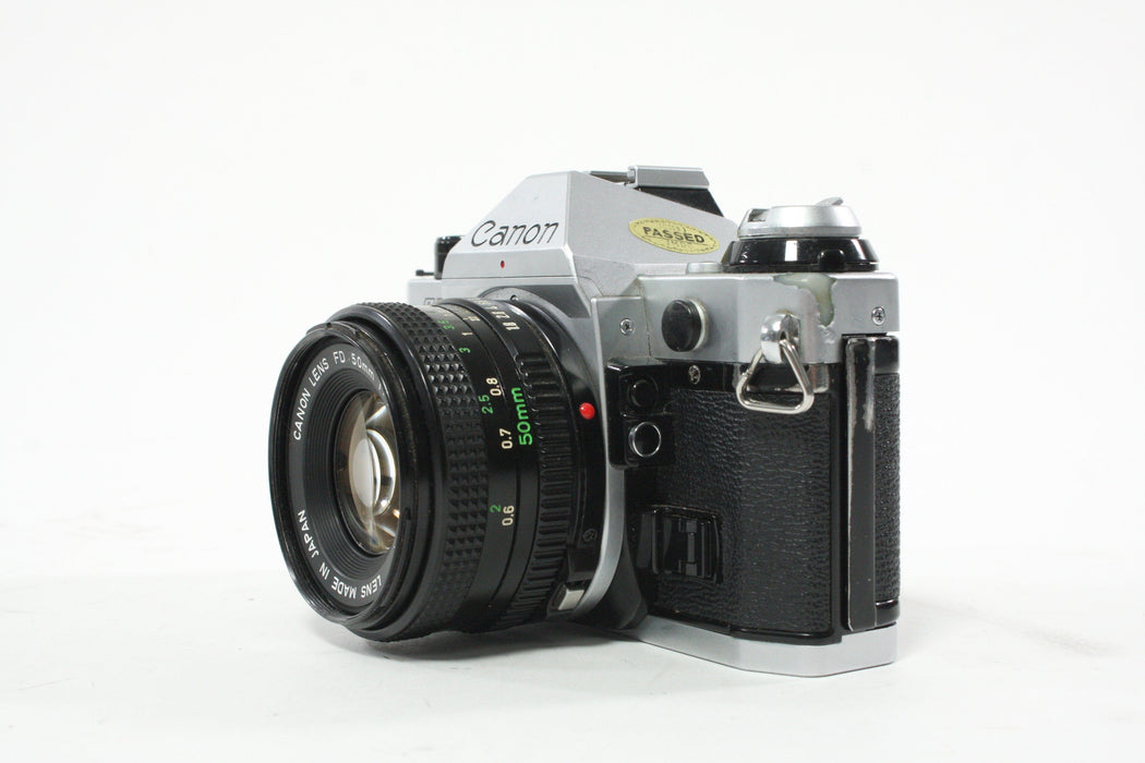 Canon AE-1 Program 35mm SLR Camera with 50mm f/1.8 FD Lens