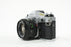 Canon AE-1 Program 35mm SLR Camera with 50mm f/1.8 FD Lens