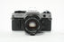 Canon AE-1 Program 35mm SLR Camera with 50mm f/1.8 FD Lens