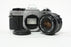 Canon AE-1 Program 35mm SLR Camera with 50mm f/1.8 FD Lens
