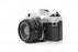 Canon AE-1 Program 35mm SLR Camera with 50mm f/1.8 Lens
