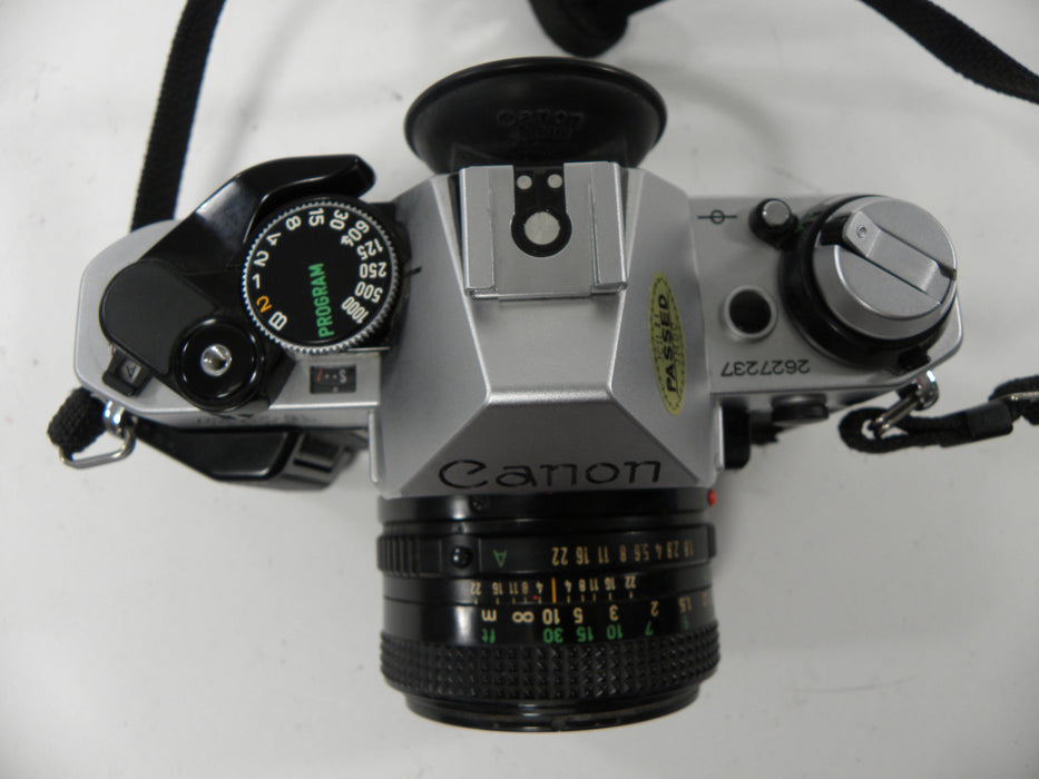 Canon AE-1 Program 35mm SLR Camera with 50mm f/1.8 FD Lens