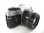 Canon AE-1 Program 35mm SLR Camera with a 50mm f/1.8 FD Lens