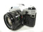 Canon AE-1 Program 35mm SLR Camera with a 50mm f/1.8 FD Lens
