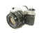Canon AE-1 Program 35mm SLR Camera with 50mm f/1.8 FD Lens