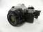 Canon AE-1 Program 35mm SLR Camera with a 50mm f/1.8 S.C. FD Lens