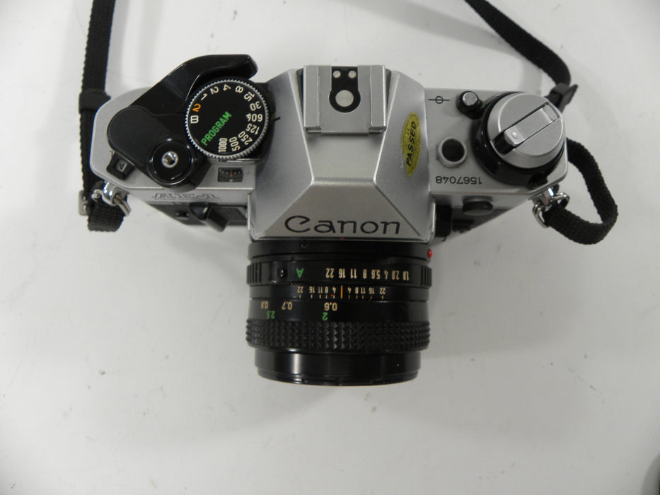 Canon AE-1 Program 35mm SLR Camera with a 50mm f/1.8 S.C. FD Lens