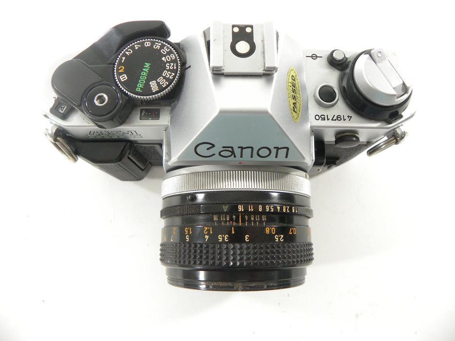 Canon AE-1 Program 35mm SLR Camera with a 50mm f/1.8 S.C. FD Lens