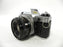 Canon AE-1 Program 35mm SLR Camera with a 50mm f/1.8 S.C. FD Lens