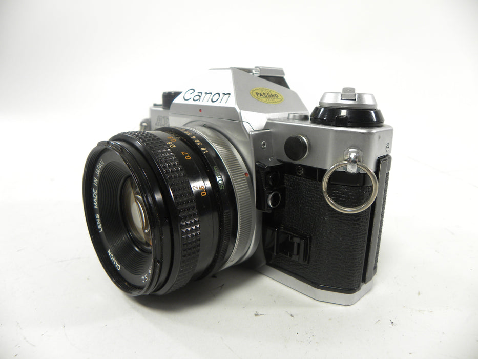 Canon AE-1 Program 35mm SLR Camera with a 50mm f/1.8 S.C. FD Lens
