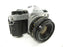 Canon AE-1 Program 35mm SLR Camera with a 50mm f/1.8 S.C. FD Lens