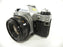 Canon AE-1 Program 35mm SLR Camera with a 50mm f/1.8 S.C. FD Lens