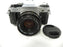 Canon AE-1 Program 35mm SLR Camera with a 50mm f/1.8 S.C. FD Lens