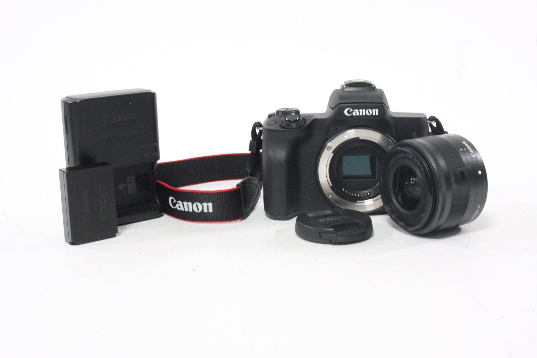 Canon EOS M50 Mirrorless with 15-45mm f/3.5-6.3 IS STM EF-M Shutter less than 2,000