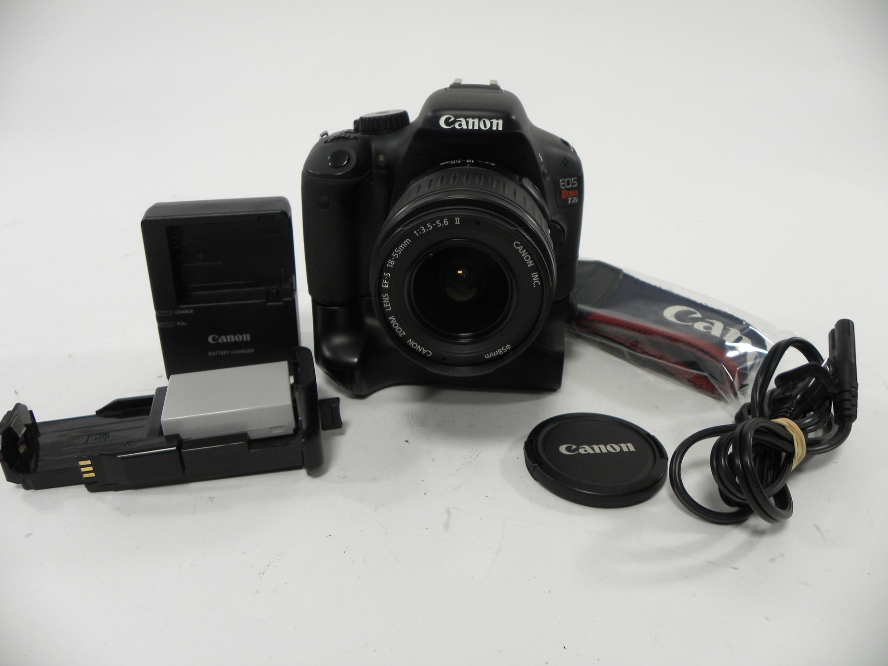 Canon EOS Rebel T2i 18mp Digital SLR w/EF-S 18-55 and grip S/C 2,489