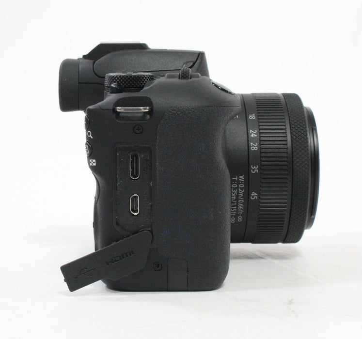 Canon R100 Mirrorless Digital Camera with 18-45mm f/4.5-5.6 IS STM Lens with Shutter Count (less than) 1,000