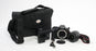 Canon Rebel T6 Digital SLR with 18-55mm f/3.5-5. IS II Lens SC 3484