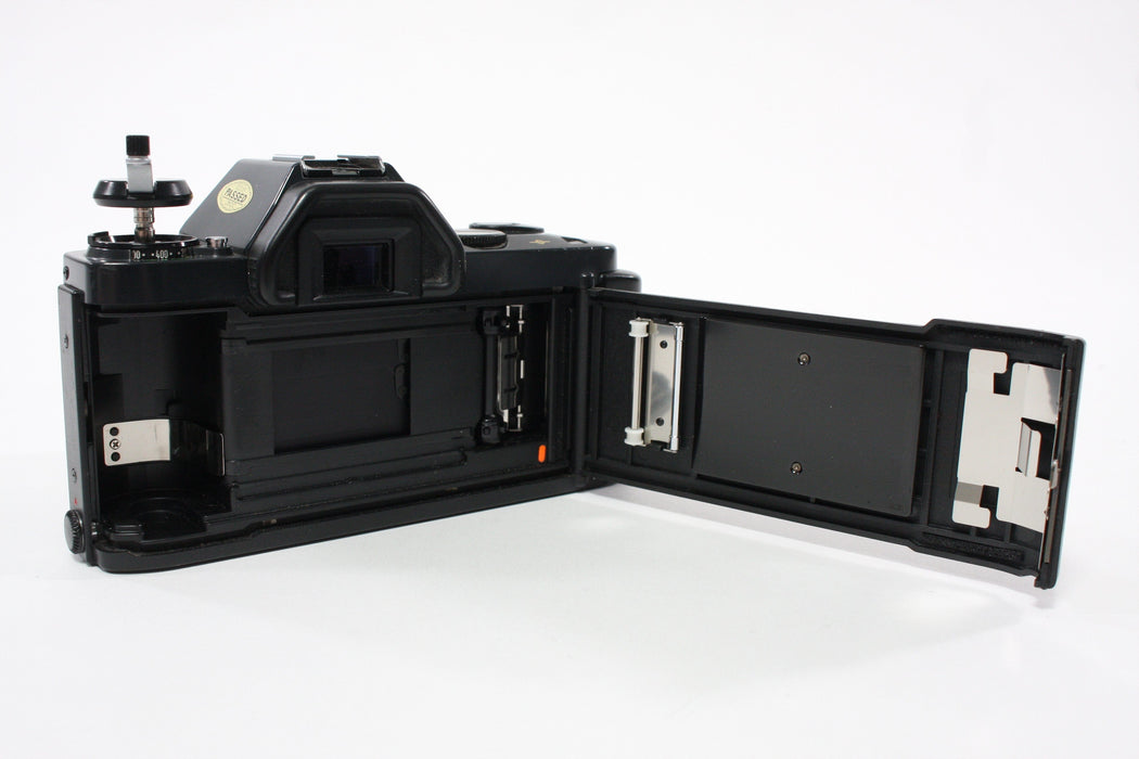 Canon T50 35mm SLR Camera with 50mm f/1.8 FD Lens