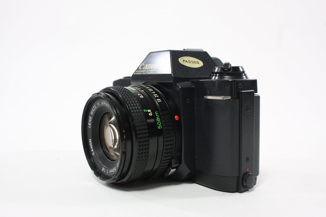 Canon T50 35mm SLR Camera with 50mm f/1.8 FD Lens