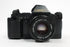Canon T70 35mm SLR Camera with 50mm f/1.8 Lens