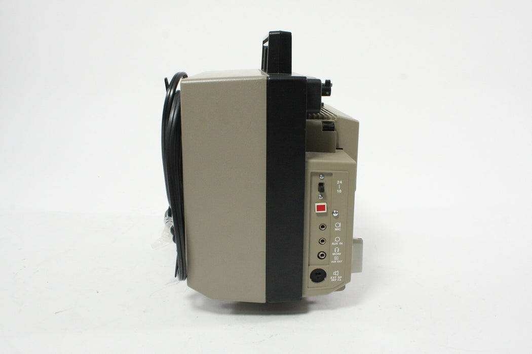 Elmo ST-180E M 2-Track Super 8 Sound Projector with 15-25mm f/1.3 Lens