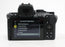 Nikon 250II Mirrorless Digital Camera with Shutter Count ONLY 52.  Includes 2 Lens Kit (see description).