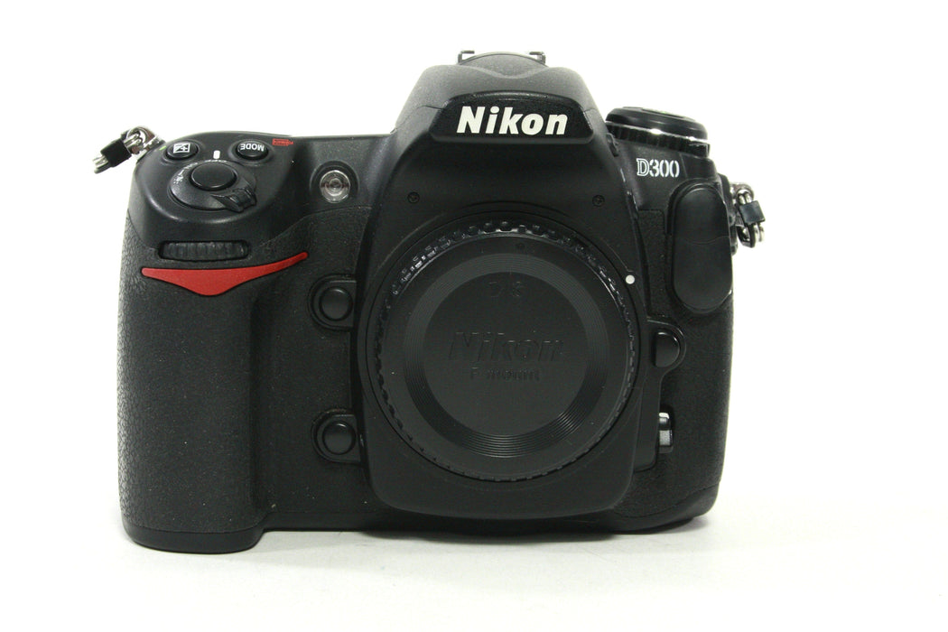 Nikon D300 Digital SLR w Nikon Grip and 2 AA Trays - Shutter Count 9,630