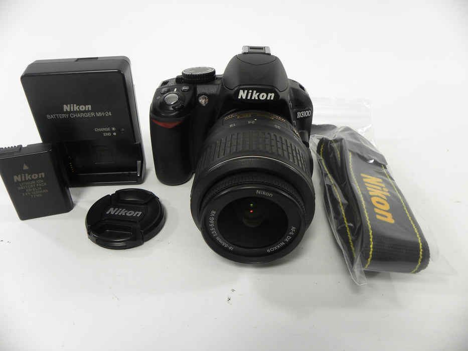 Nikon D3100 14.2mp Digital SLR w/AF-S 18-55 DX VR Shutter Ct. 5,751