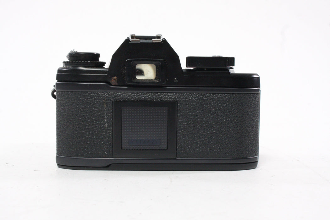 Nikon EM 35mm Camera with 35-70mm f/3.5-4.5 Lens