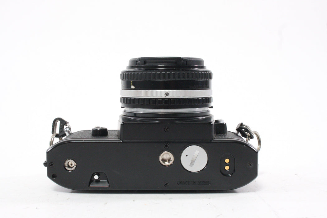 Nikon EM 35mm Camera with 50mm f/1.8 E Series Lens