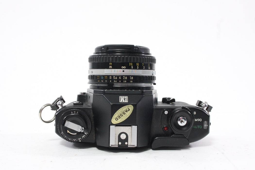 Nikon EM 35mm Camera with 50mm f/1.8 E Series Lens