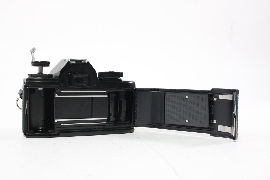 Nikon EM 35mm Camera with 50mm f/1.8 E Series Lens