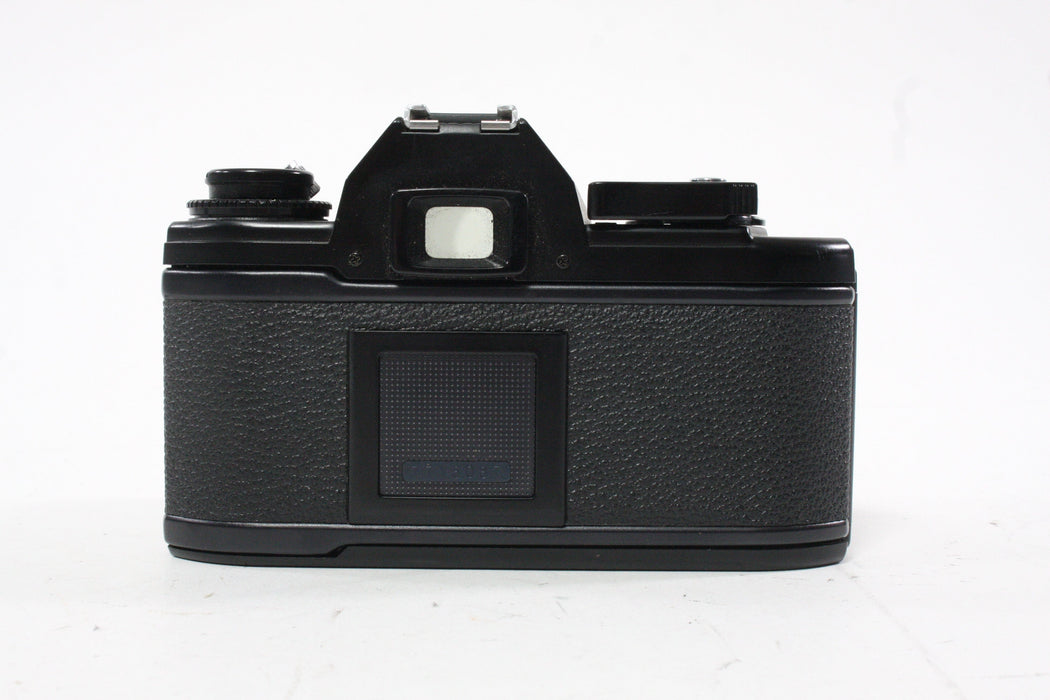Nikon EM 35mm Camera with 50mm f/1.8 E Series Lens