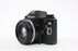 Nikon EM 35mm Camera with 50mm f/1.8 E Series Lens
