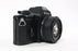 Nikon EM 35mm SLR Camera with 50mm f/1.8 E Series Lens