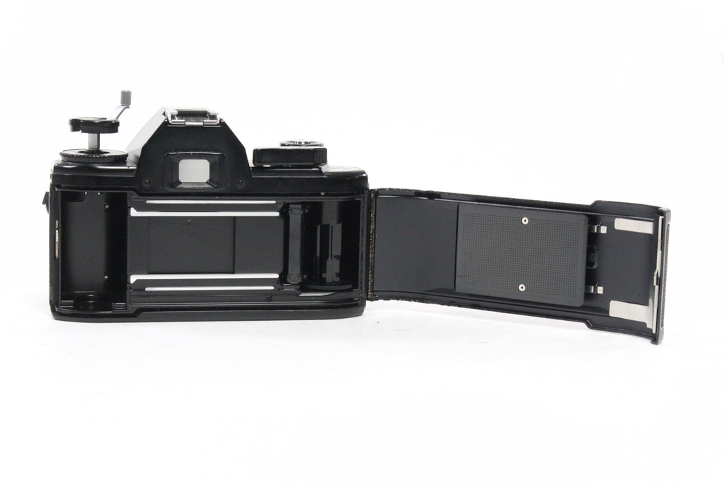 Nikon EM 35mm SLR Camera with 50mm f/1.8 Lens