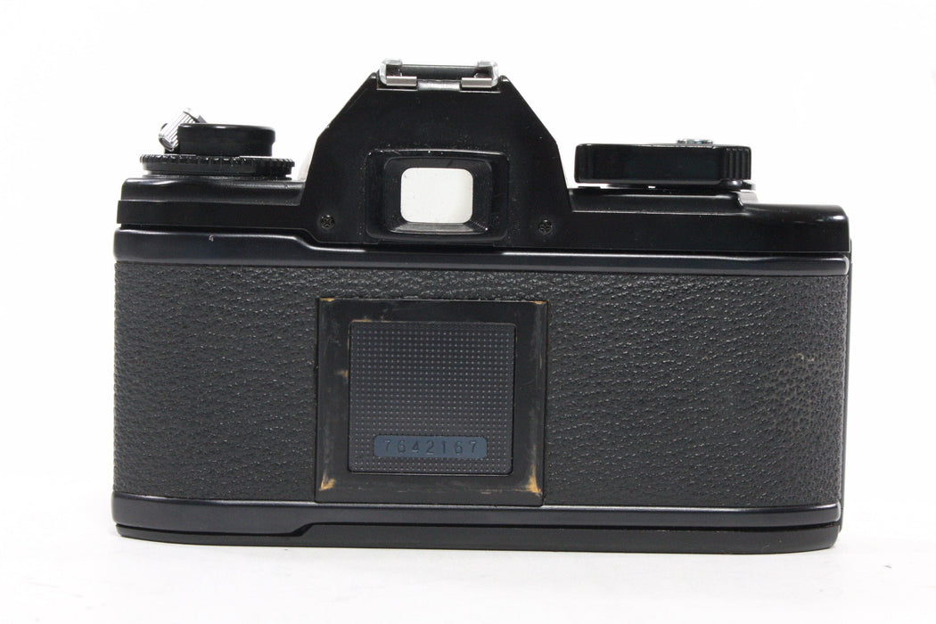Nikon EM 35mm SLR Camera with 50mm f/1.8 Lens
