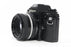 Nikon EM 35mm SLR Camera with 50mm f/1.8 Lens