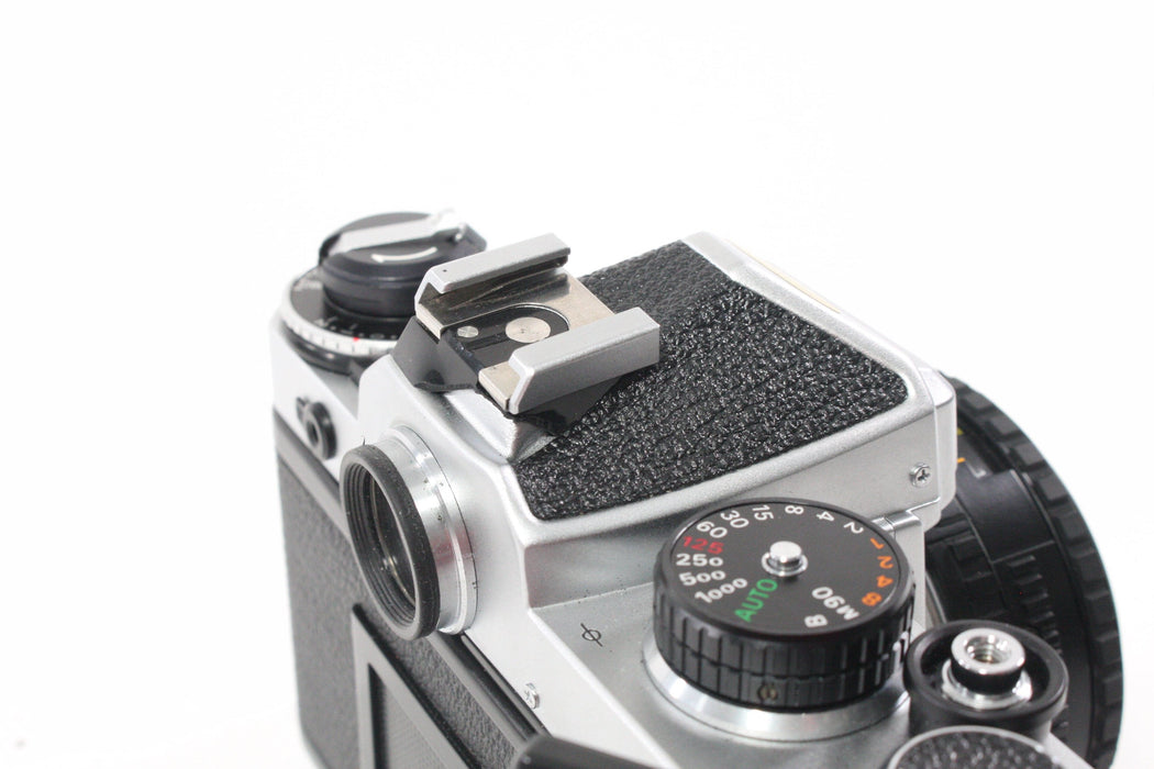Nikon FE Chrome 35mm SLR Camera with 50mm f/1.8 Lens