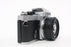 Nikon FE Chrome 35mm SLR Camera with 50mm f/1.8 Lens