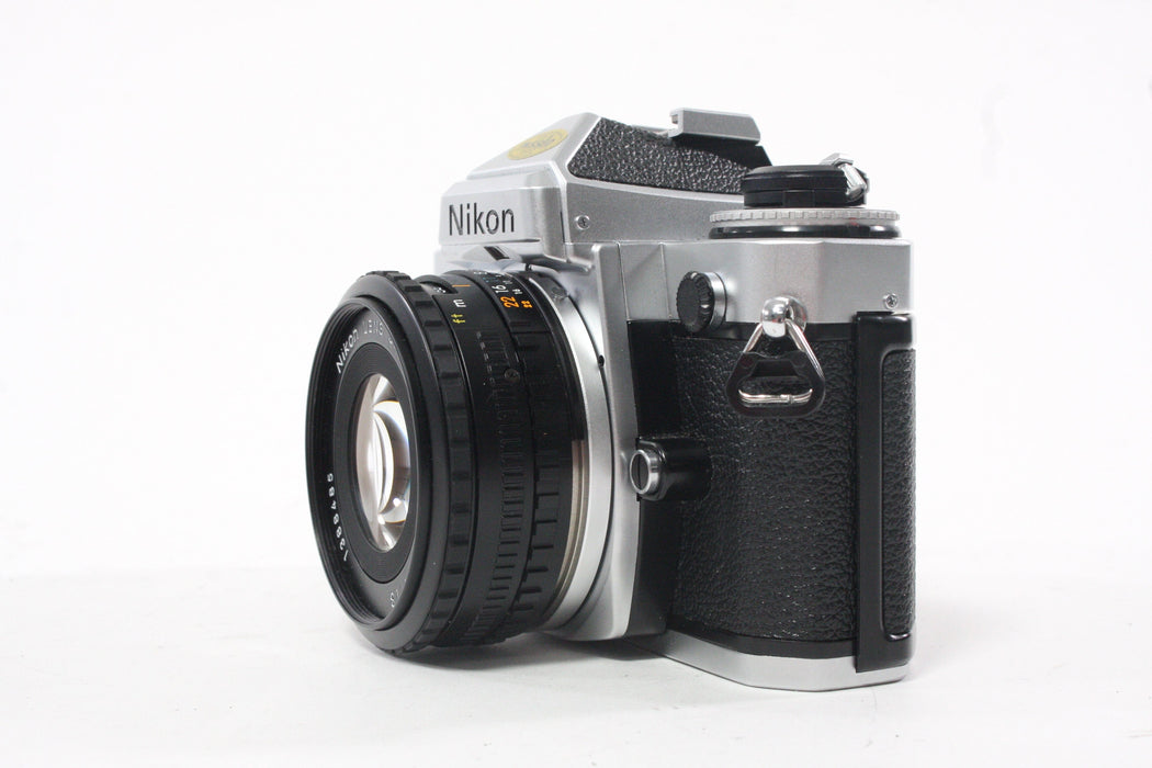 Nikon FE Chrome 35mm SLR Camera with 50mm f/1.8 Lens