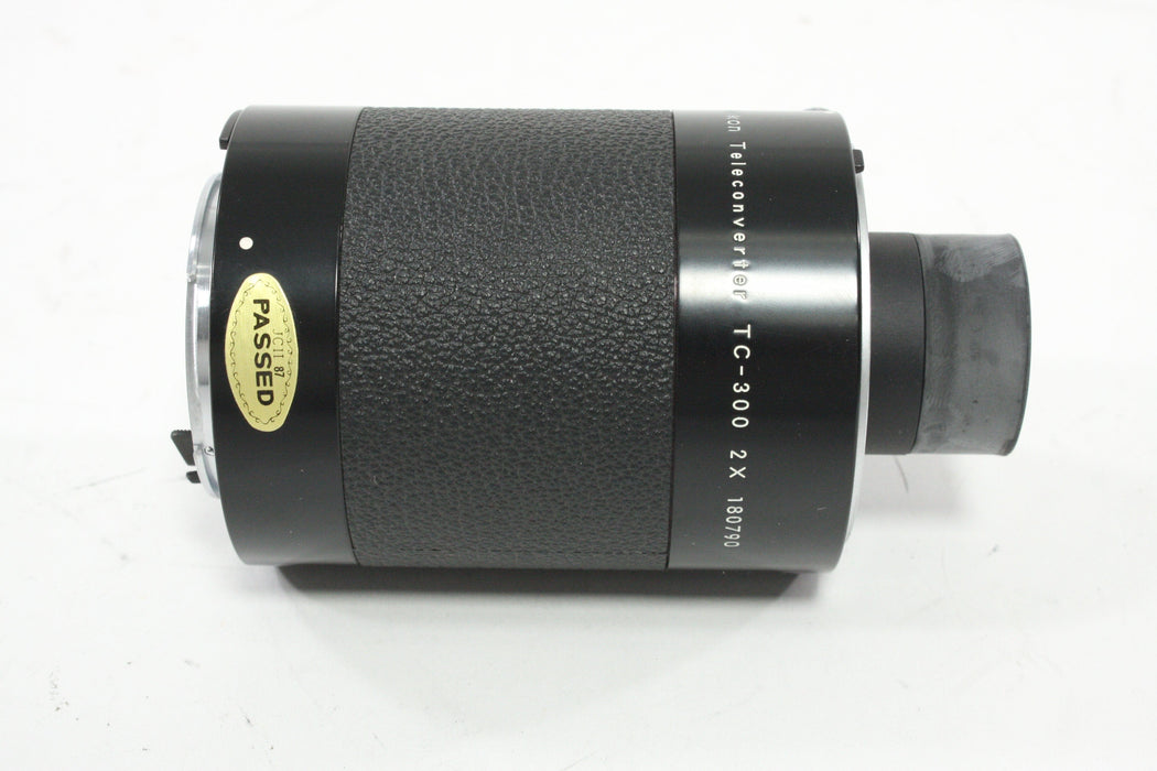 Nikon Teleconverter TC-300 2X for Nikon AI Lenses with a Focal Length of over 300mm.